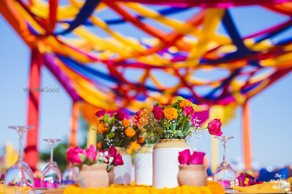 Photo of colourful mehendi decor idea with pickle jars