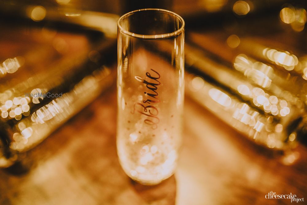 Photo of Bride getting ready shot glass