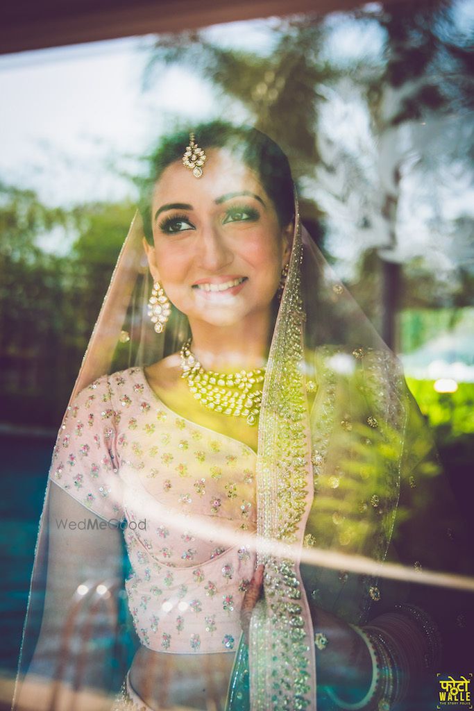 Photo of Bride by the window looking out