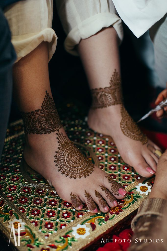 Photo of Unique feet mehendi mandala design