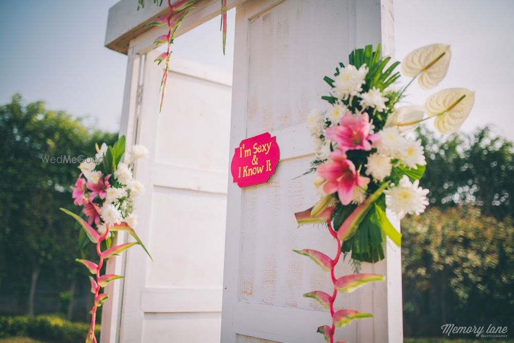 Photo of White wooden doorway entrance in garden engagement