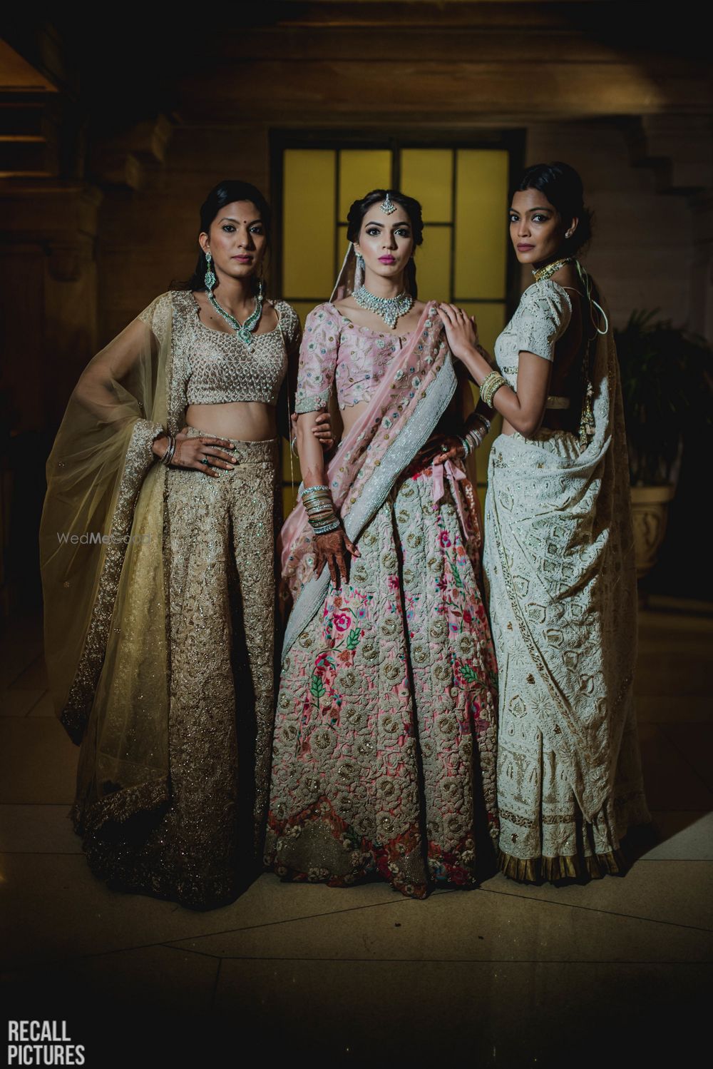 Photo of Bride with sisters portrait