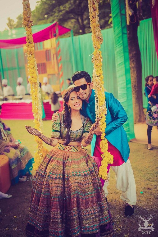 Photo of Bride and groom on mehendi day