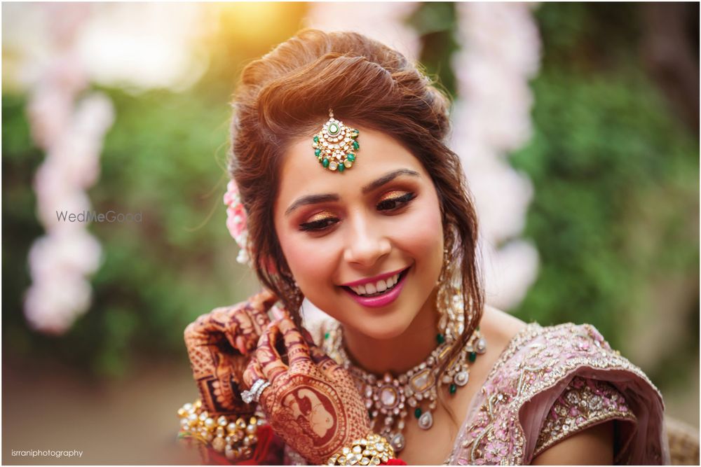 Photo of A cute bridal getting ready portrait