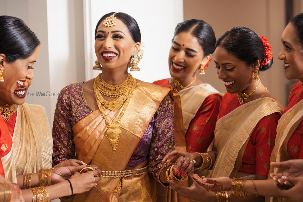 Photo of bridal getting ready shot with bridesmaids