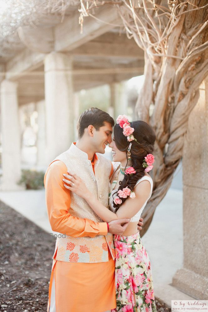 Photo of Cute romantic couple portrait on mehendi