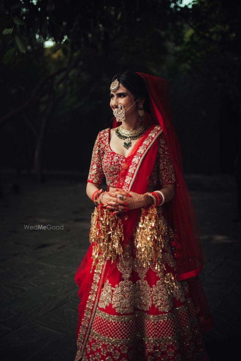 Photo of Bridal portrait of bride in red