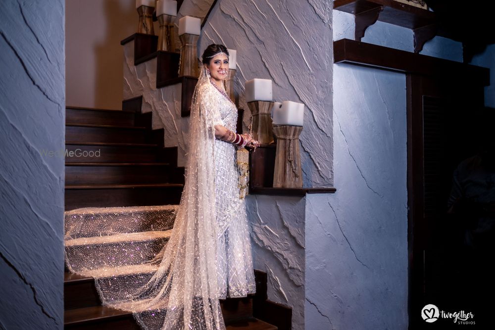 Photo of Bride in a white saree