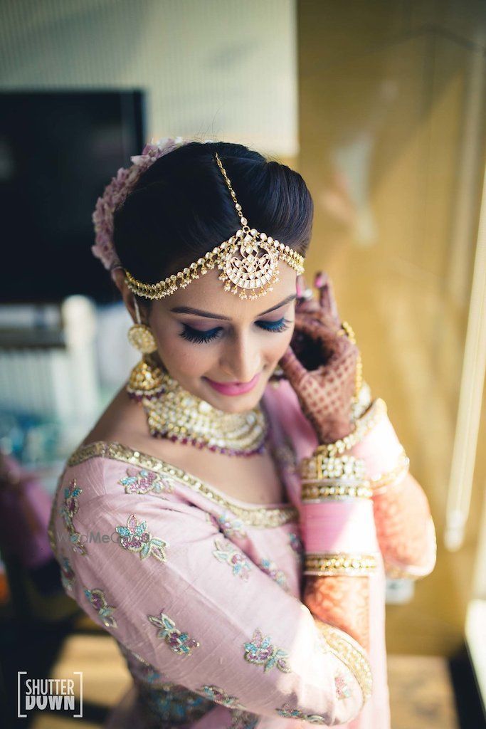 Photo of Bride getting ready shot wearing jewellery