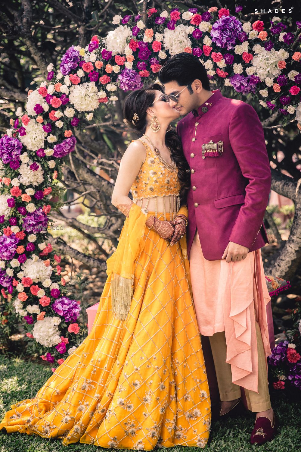 Photo of Bride and groom mehendi outfits