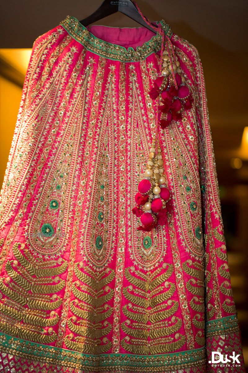 Photo of bright pink and turquoise lehenga