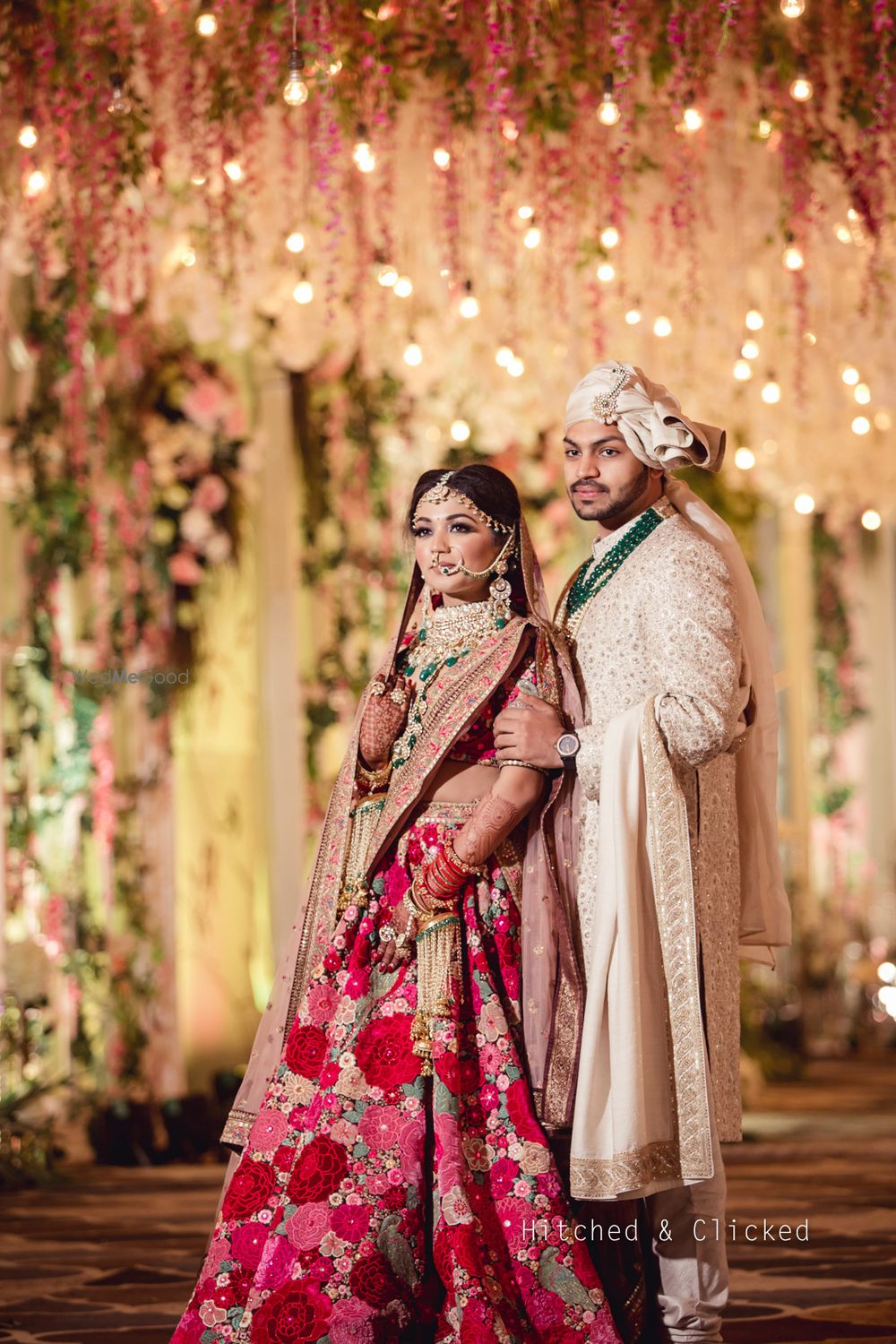 Photo of Sabyasachi bridal lehenga with contrasting groom