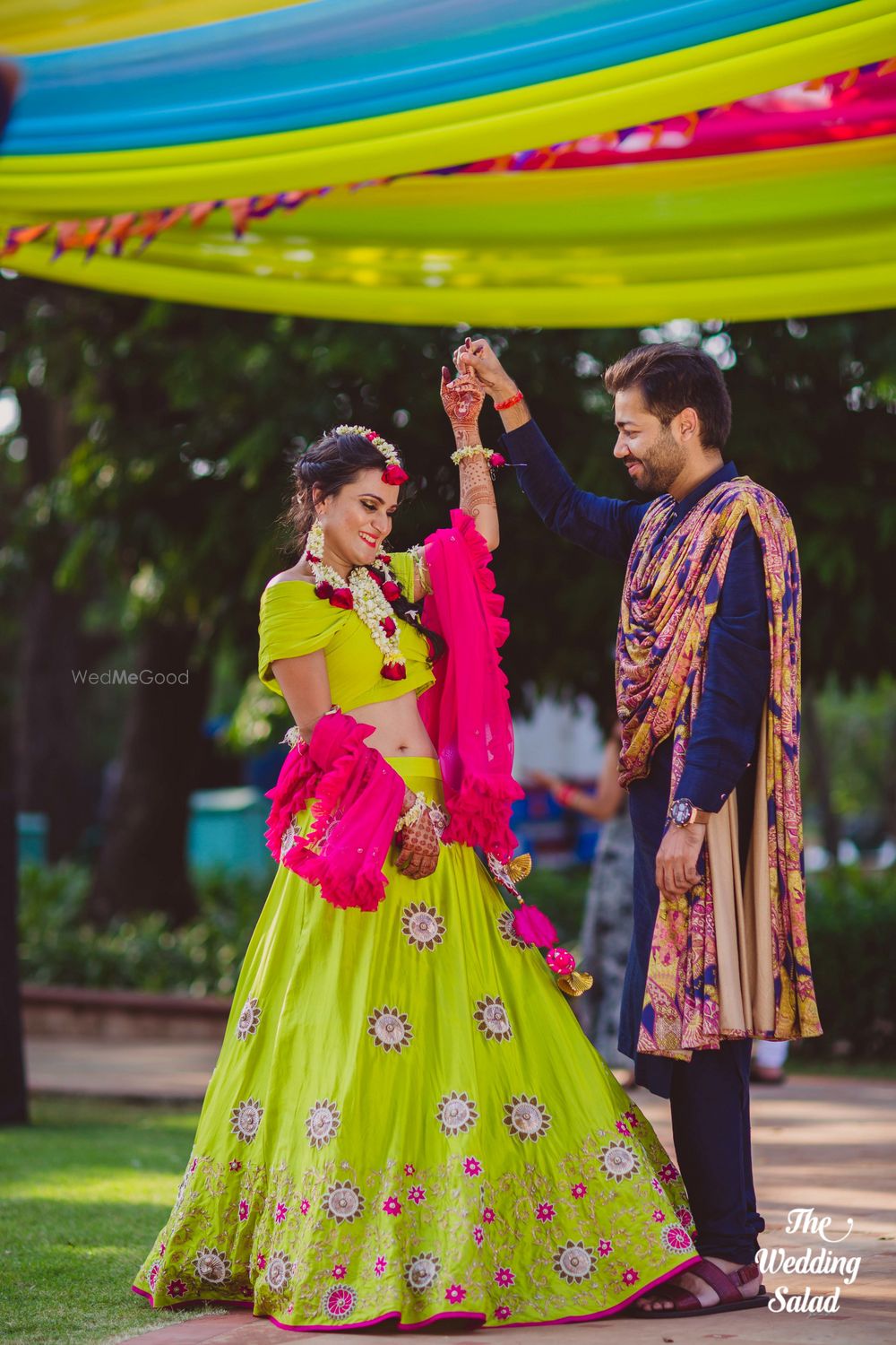 Photo of Light green and pink bright lehenga with ruffled dupatta