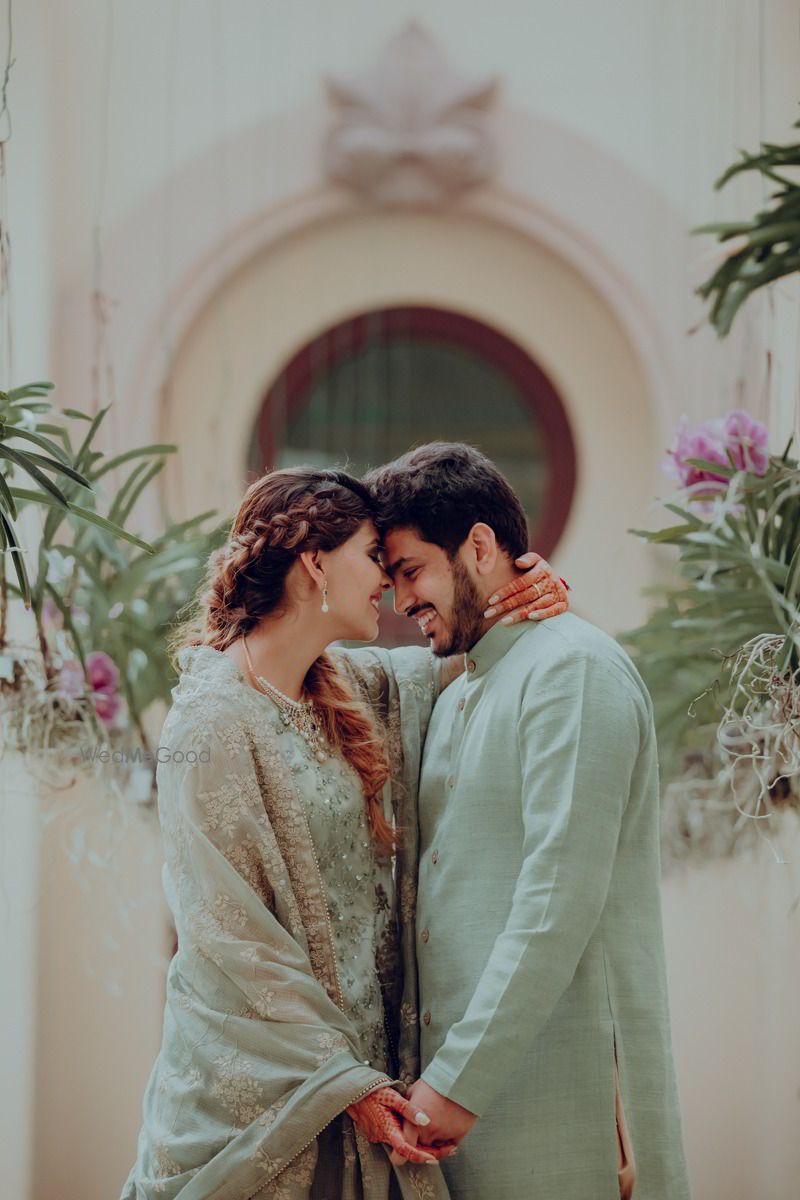 Photo of Bride and groom on engagement in an intimate portrait