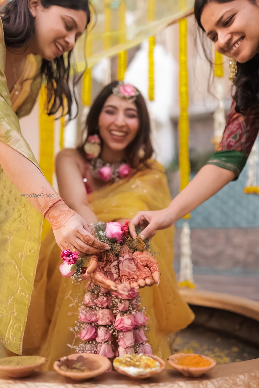 Photo of Unique Pose Idea for Bride and Bridesmaid on Haldi