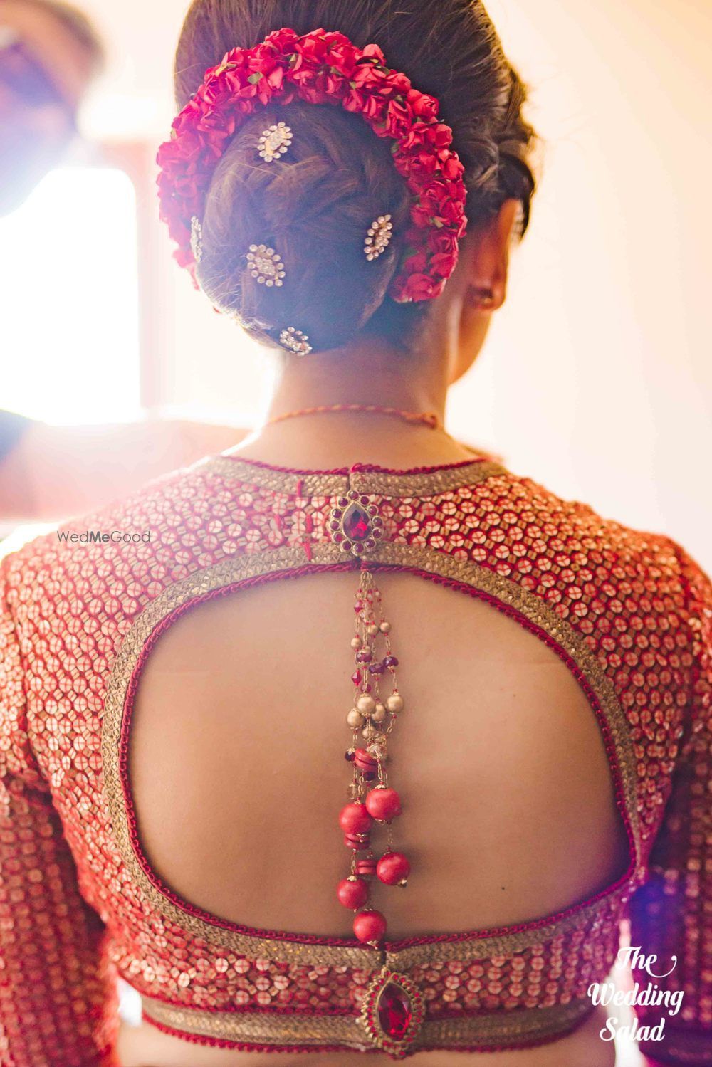 Photo of Bridal back with bun and keyhole style blouse