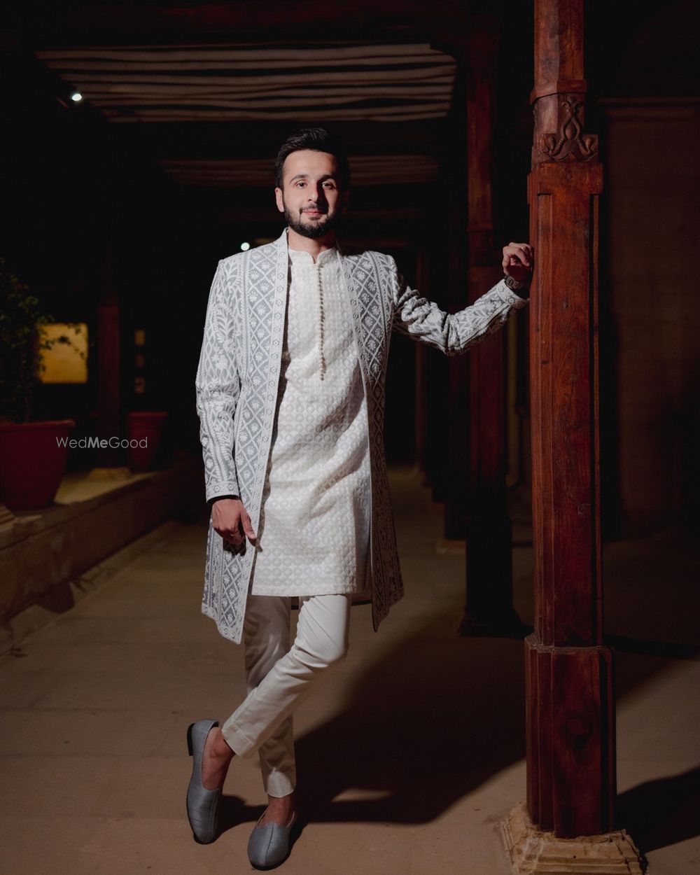 Photo of Unique grey and ivory groom sherwani with intricate detailing