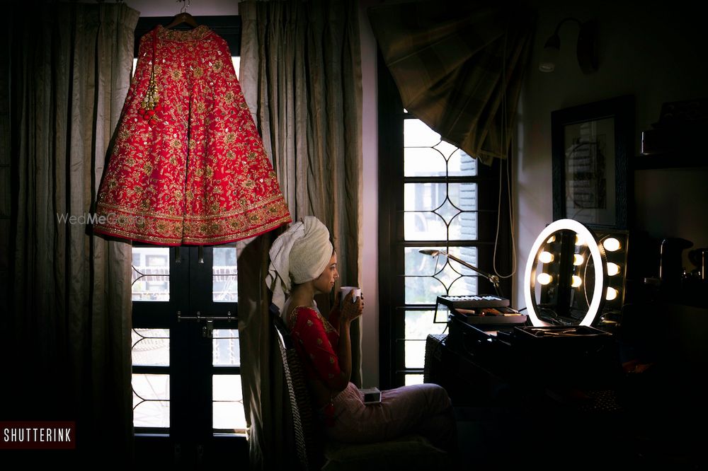 Photo of Bride with lehenga getting ready moment