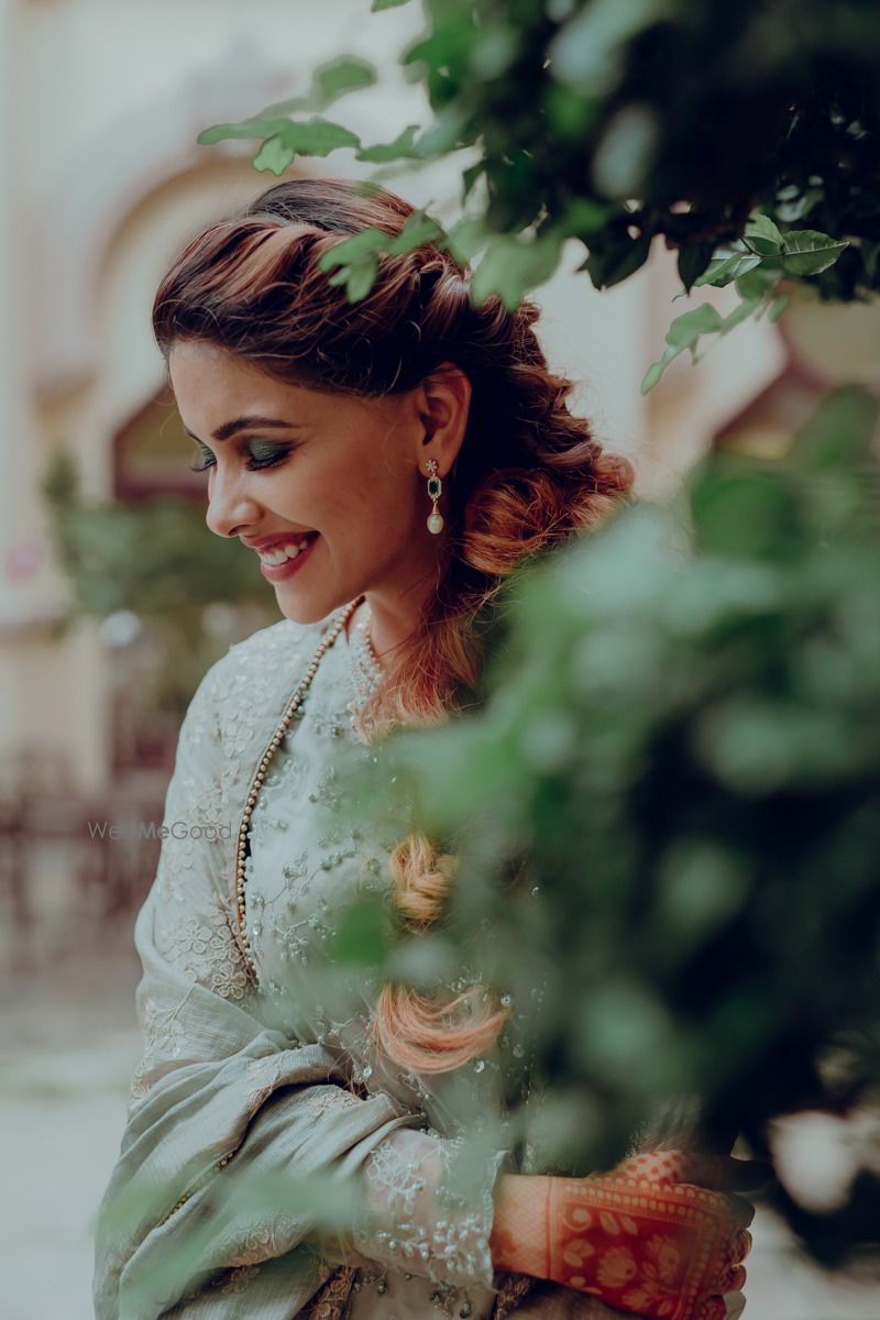 Photo of Curly messy braid idea for engagement