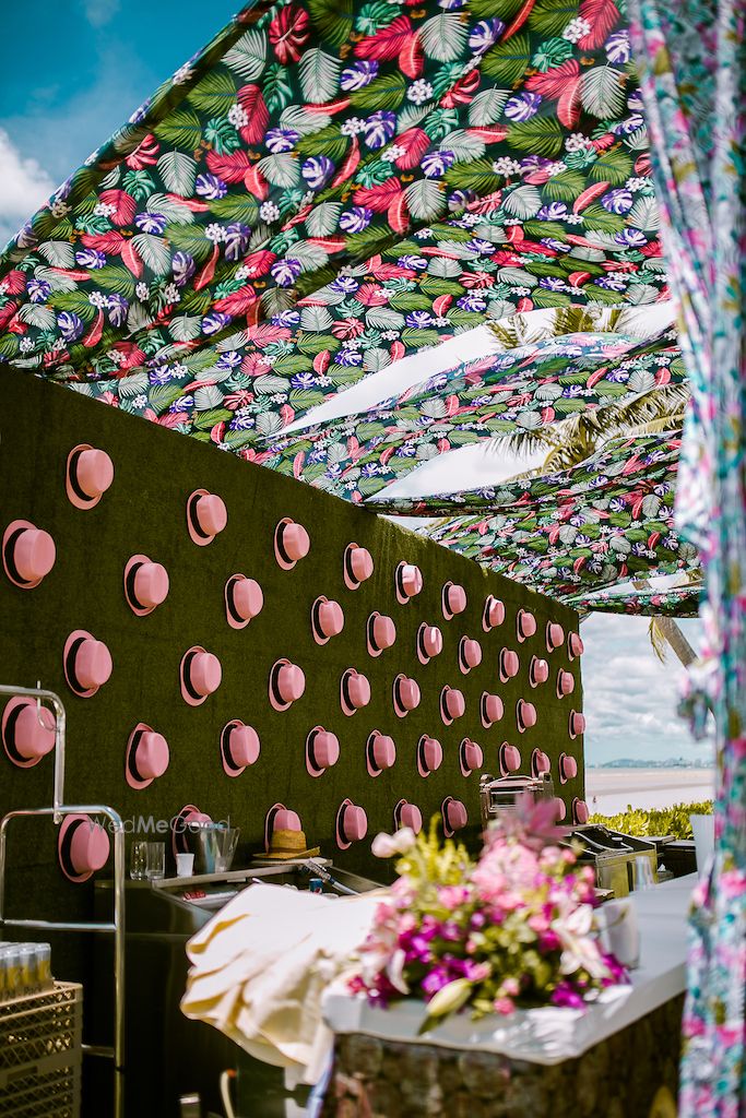 Photo of Floral tent with hat backdrop for mehendi