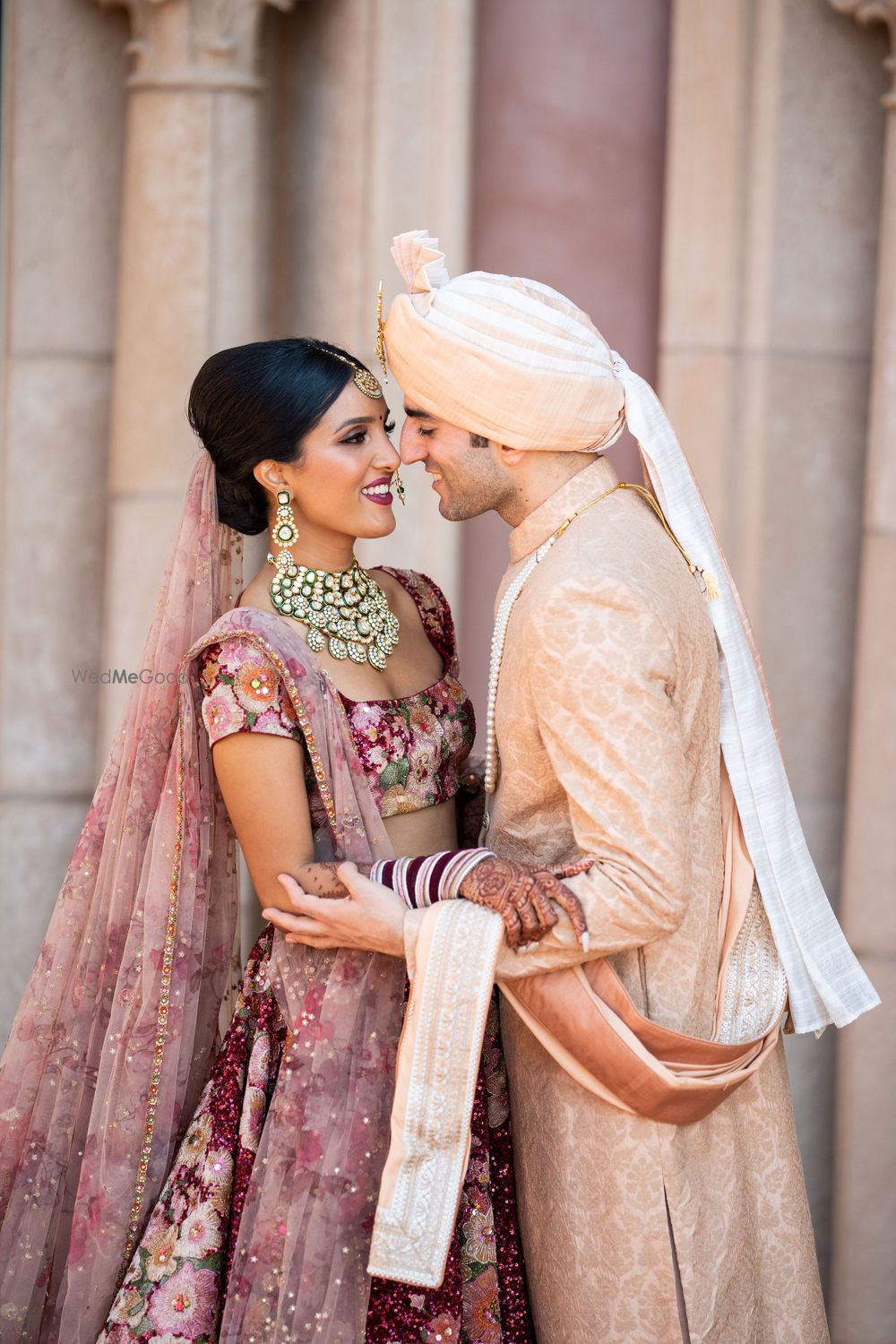 Photo of romantic shot with contrasting bride and groom in different colours