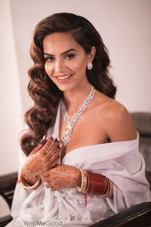 Photo of Bride getting ready shot idea in robe