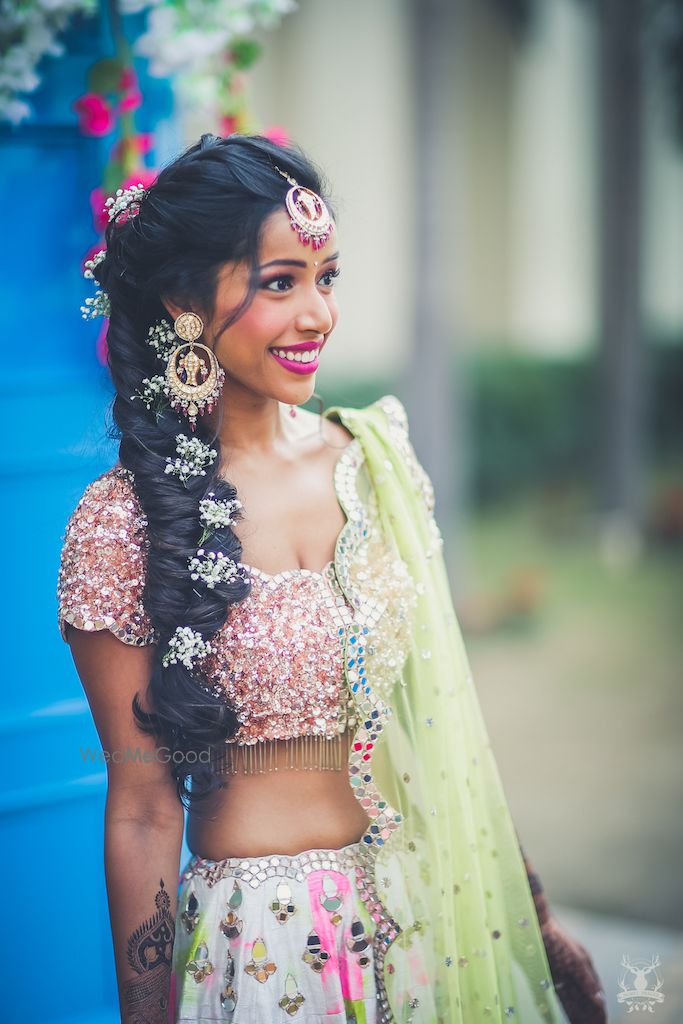 Photo of Disney princess hairstyle with babys breath on mehendi