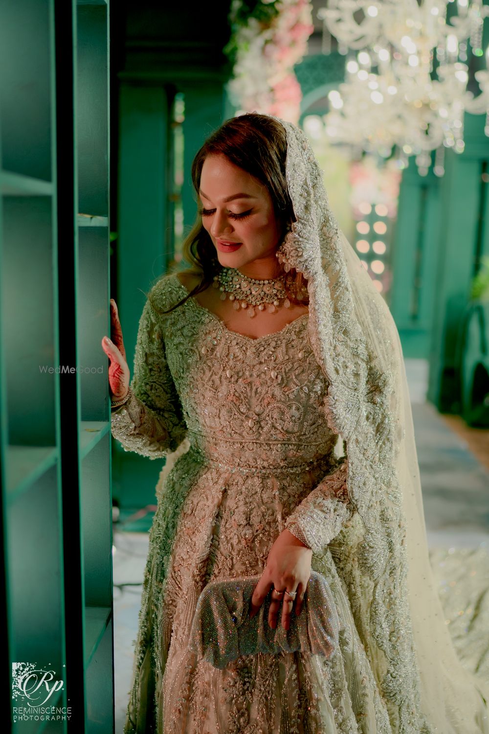 Photo of Muslim bride in a silver gown