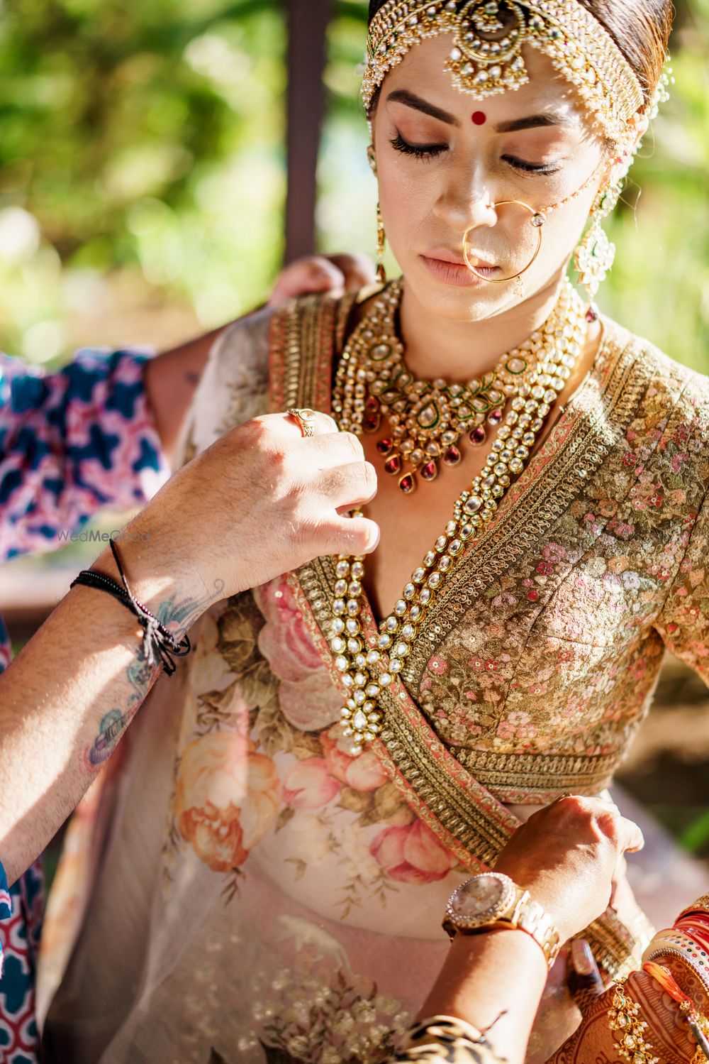 Photo of burnt orange sabyasachi lehenga with floral dupatta