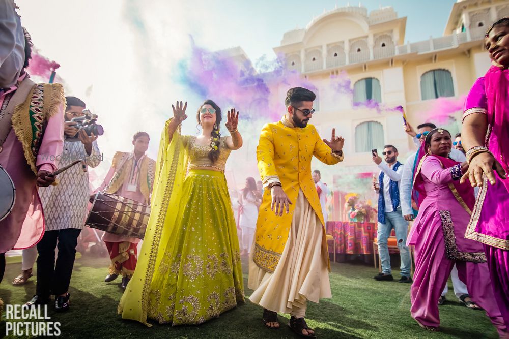 Photo of Mehendi holi party shot while couple enters