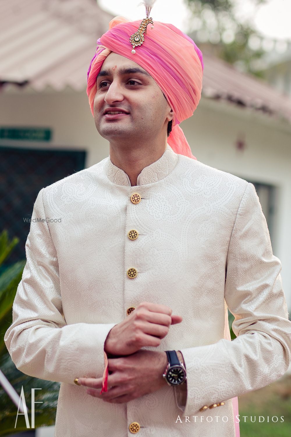 Photo of White sherwani with ombre pink safa