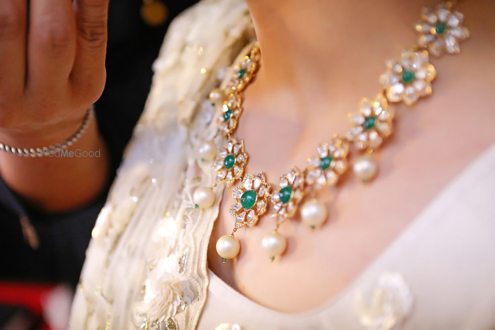 Photo of Simple bridal necklace with diamonds and emeralds