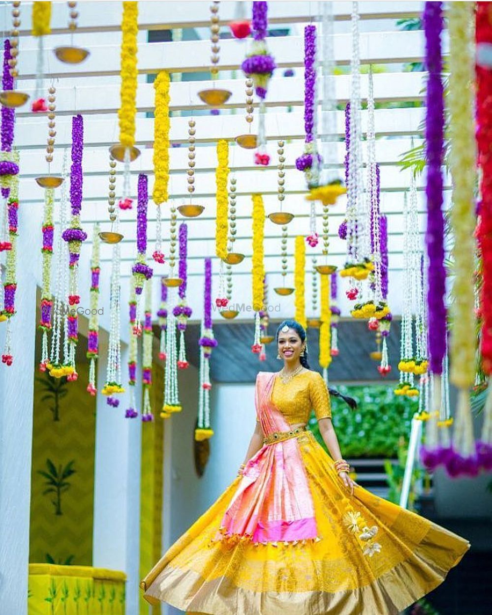 Photo of Kanjivaram lehenga in yellow and pink with waistbelt