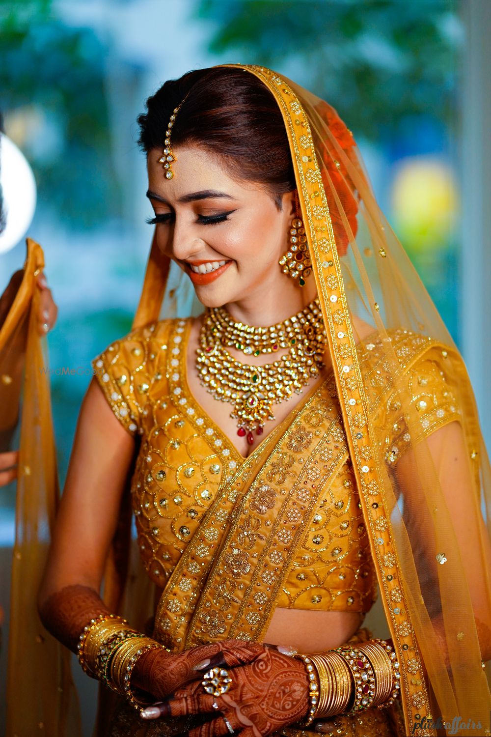 Photo of Glowing bride in orange lehenga shot