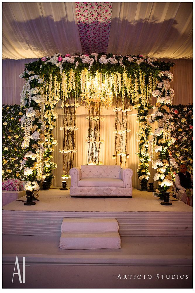 Photo of Wedding stage in white and green