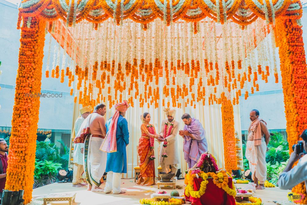 Photo of South indian mandap decor idea with orange theme