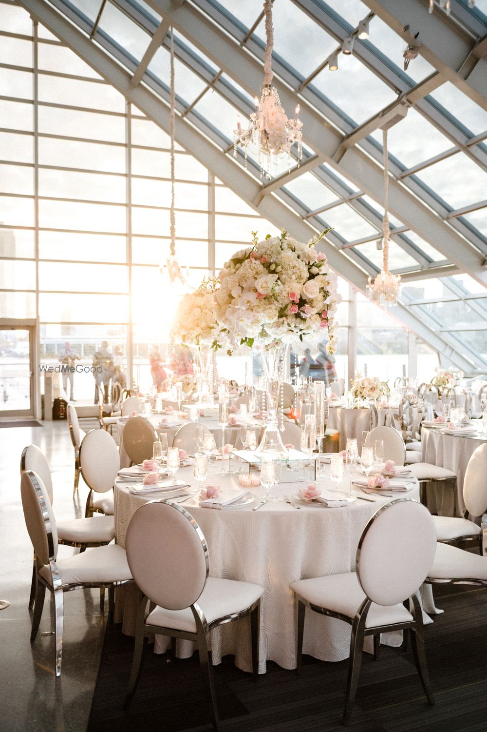 Photo of Floral table centerpiece fot a white-themed reception