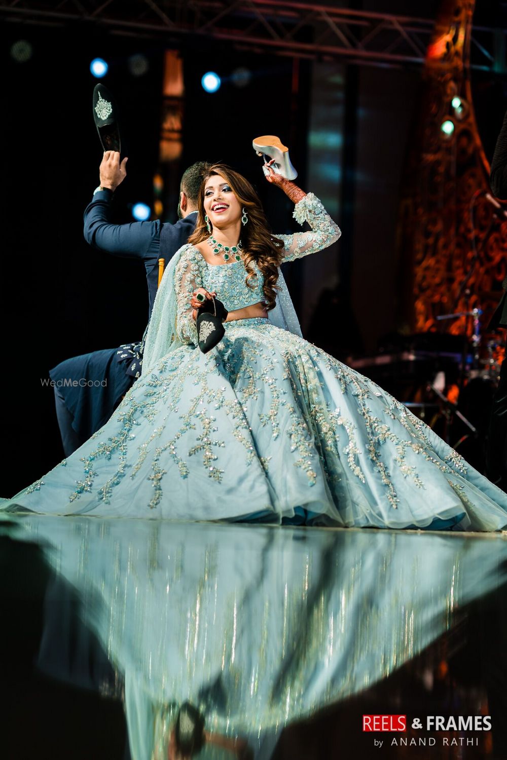 Photo of Sangeet game idea with bride and groom playing the shoe game