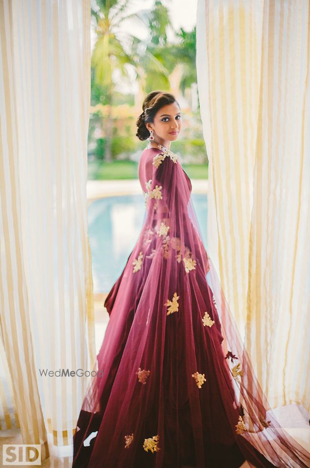 Photo of Wine colored gown by Jay Makhija