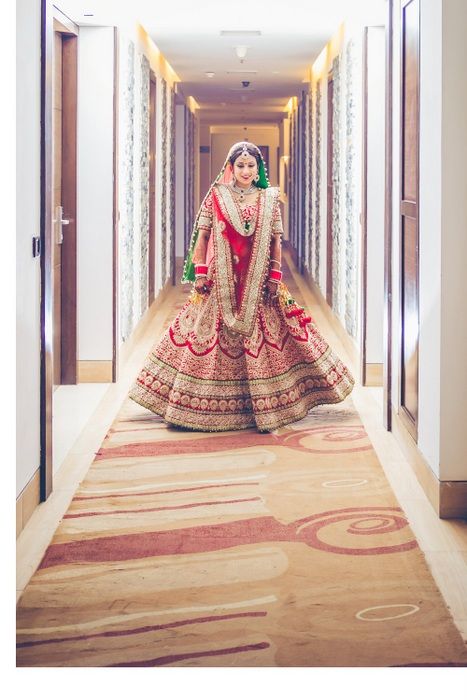 Photo of heavy red bridal lehenga