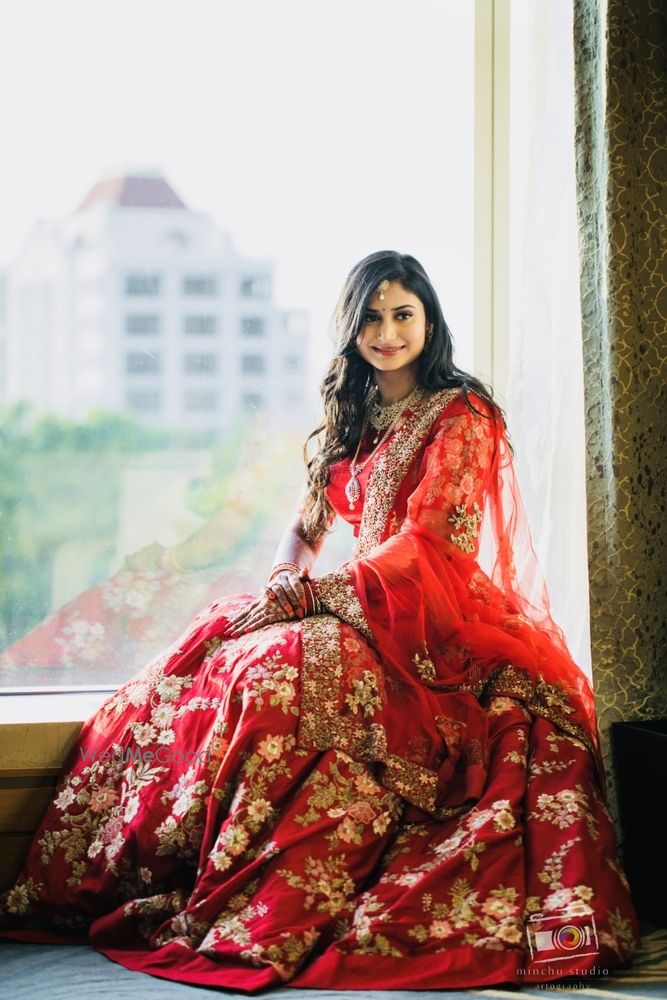 Photo of Rd lehenga with floral embroidery for reception