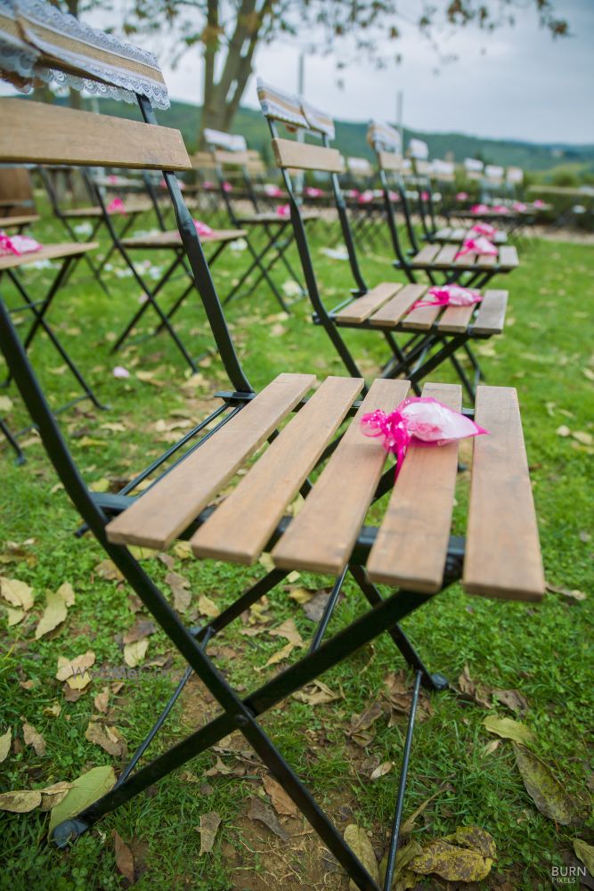 Photo of Chairs with petals for guests to throw