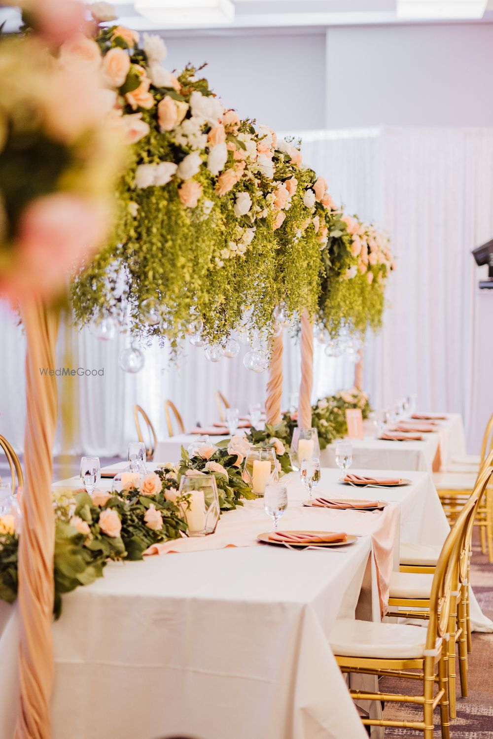 Photo of glam table decor idea with floral trellis and runner