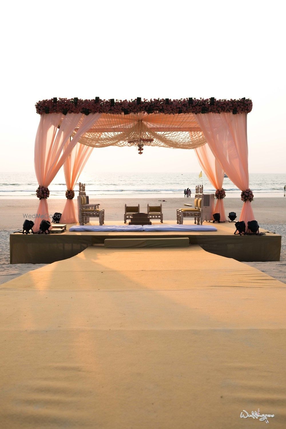 Photo of Beach mandap idea in pastel pink