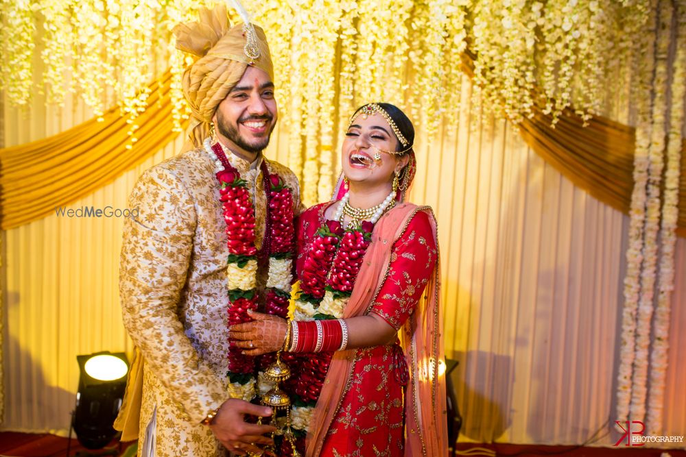 Photo of bright and happy couple shot