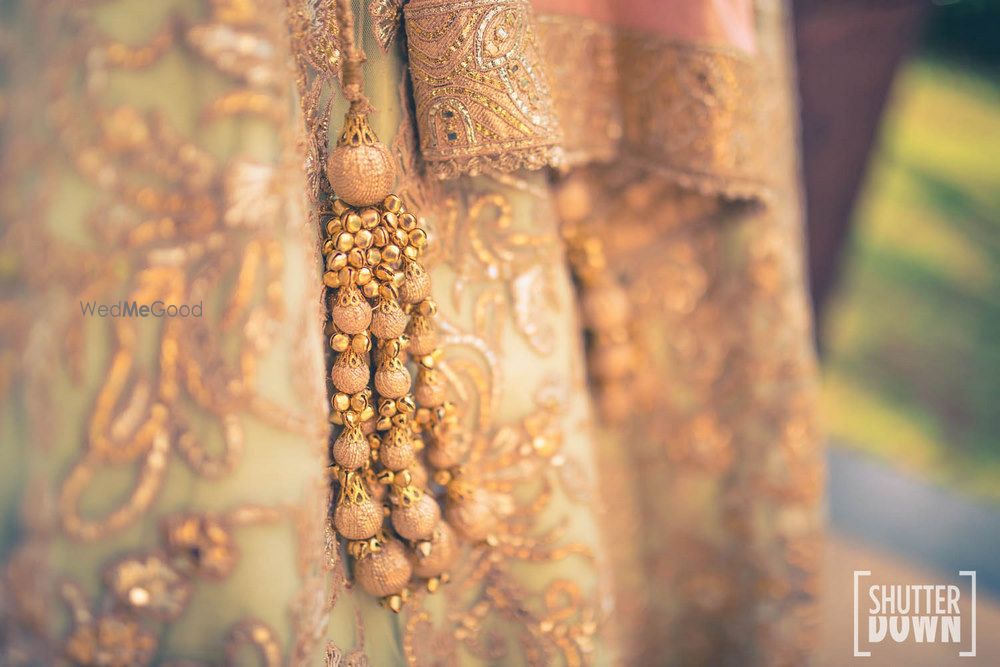 Photo of Peach tassels with lehenga