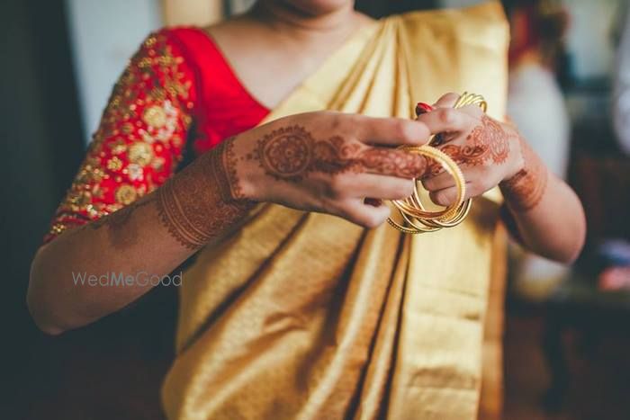 Photo of red and gold saree