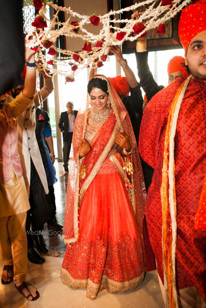 Photo of Orange and Gold Bridal Lehenga with Sequin Work