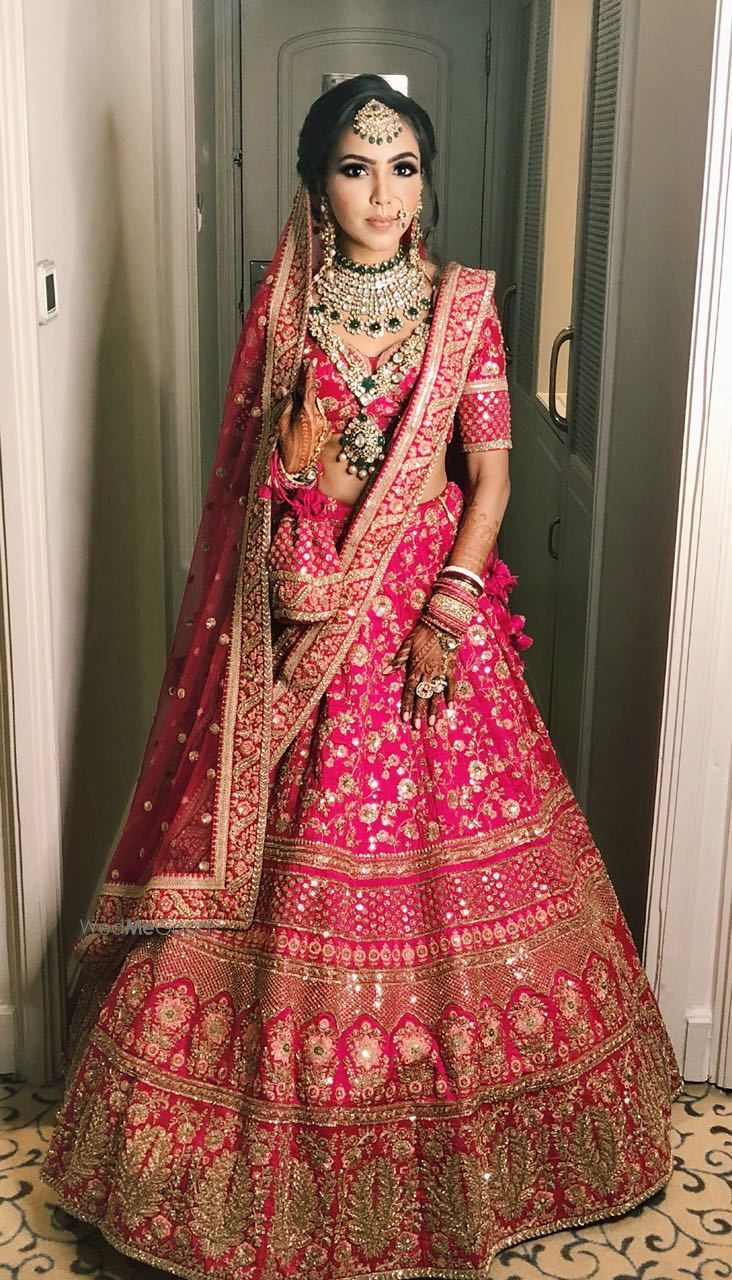 Photo of Stunning hot pink lehenga for an Indian bride