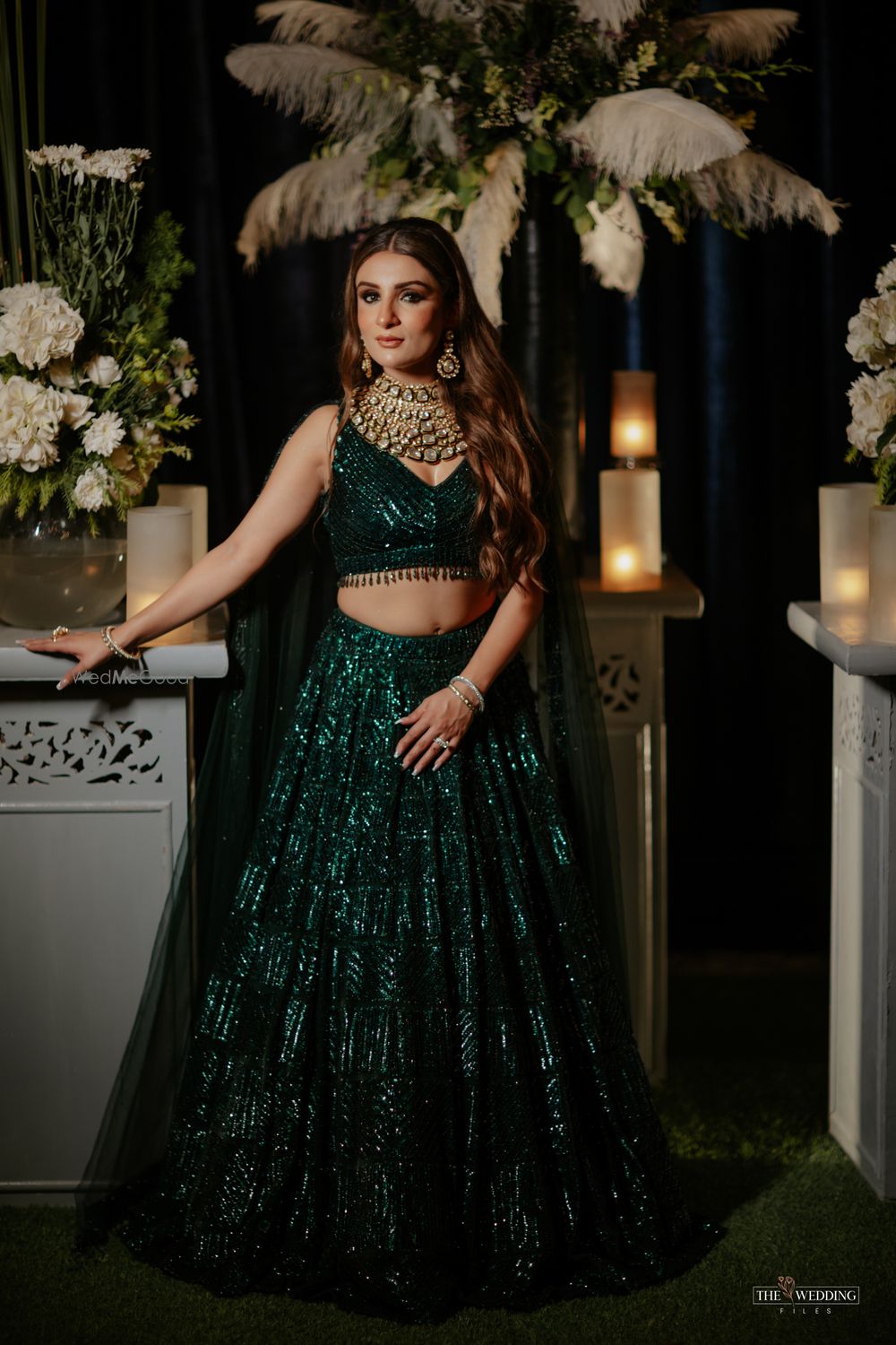 Photo of dark green sequinned lehenga